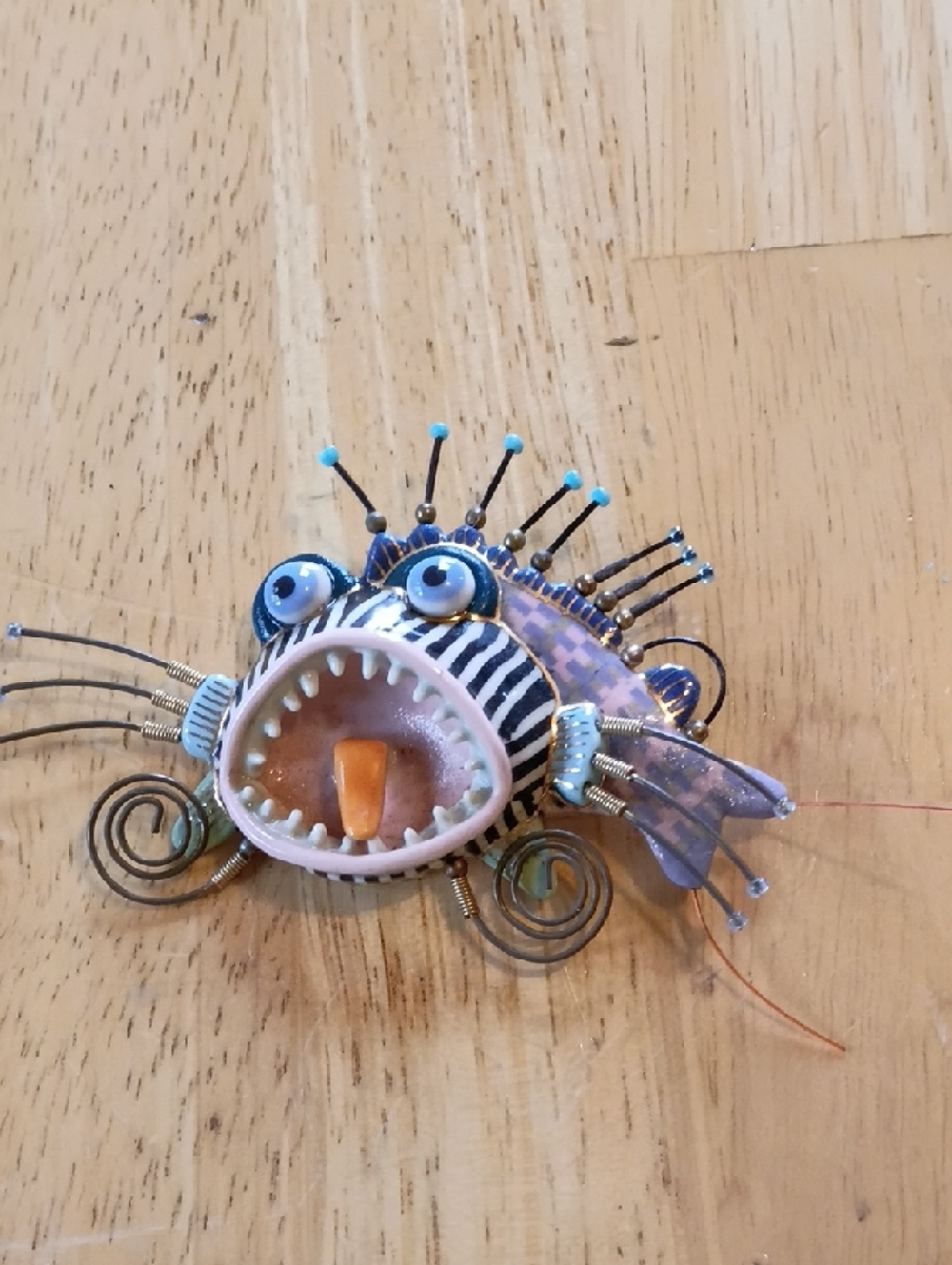 Handcrafted Purple Striped Fish Brooch with Blue Accents